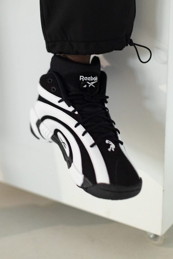 a person standing on top of a white box