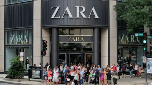 a group of people waiting to hear about zara first responder discount outside of store