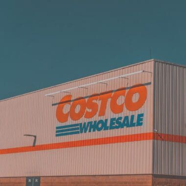 a building with a sign that says costco whole sale
