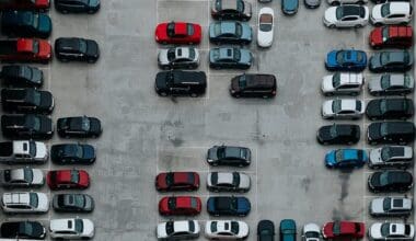 aerial photography of cars on motor source parking lot