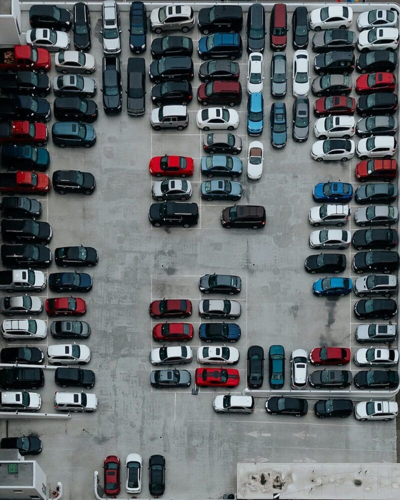aerial photography of cars on motor source parking lot