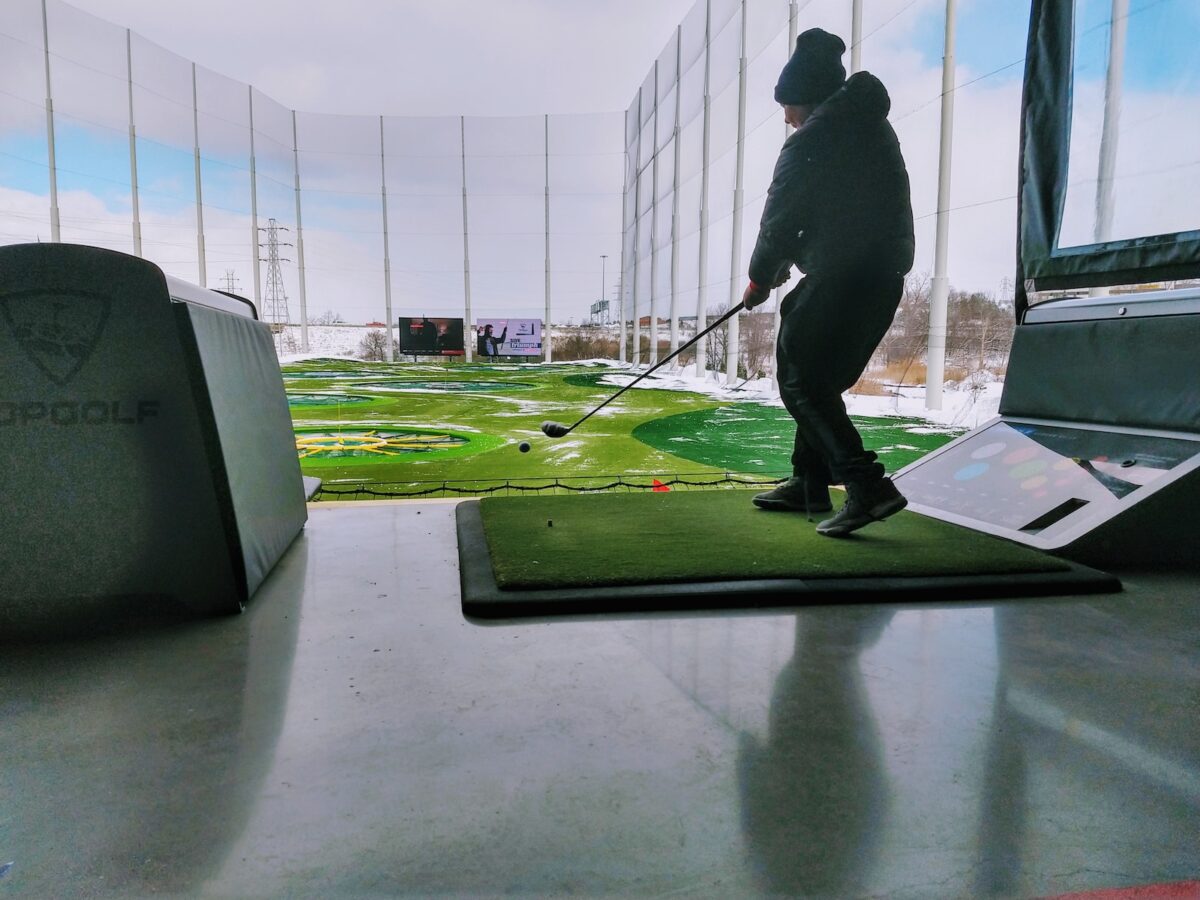 teacher playing topgolf during daytmie