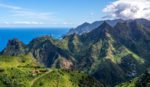 a scenic view of the mountains and ocean in Tenerife, Spain