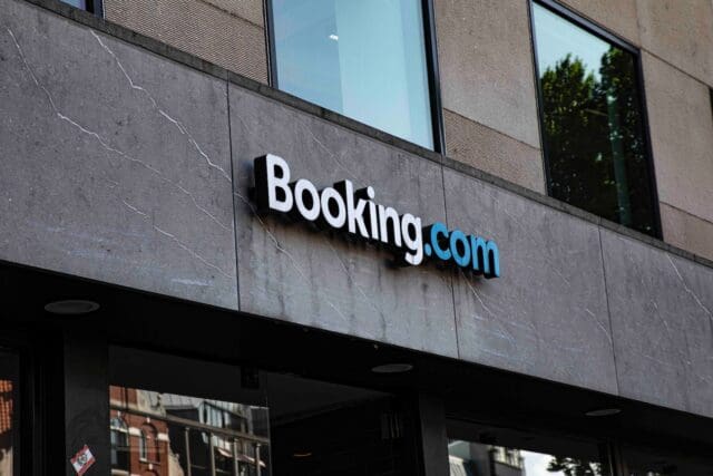 a booking.com sign on the side of a building